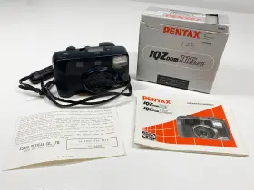 115DATE PENTAX Iqzoom