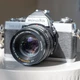 Vintage Minolta XG 7 35mm camera W/ Minolta Rokkor-x 50mm 1.7 Lens