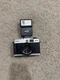 Photoflex MX-35 35mm film camera with a detachable flash