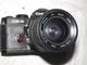 CHINON CE-4, 35MM SLR CAMERA WITH A SAKAR 35-70MM F3.5-4.5 AUTO ZOOM LENS