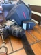 camera Canon AE-1. with canon 188A speedlite with a Diamond bag.