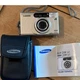 Samsung Impax 210i film camera. Point & shoot. With manual & case. Untested.