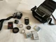 Canon AE-1 SLR Film Camera, Strap,  And Case, Lenses, Filters And Rings