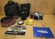 Olympus OM-2n 35mm SLR Camera & Olympus Zuiko 35-105mm Auto Zoom Lens, And Case