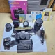 Minolta X-7A 35mm Bundle w/ 3 Kalimar Lenses, 163A Flash, Strap, Books, and Bag