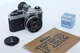Nikon FE2 35mm SLR Film Camera w/50mm f1.8 lens. Chrome. Nikon DG-2 Magnifier.