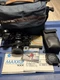 Minolta Maxxum 7000i 35mm SLR Film Camera w/ 35-80mm Lens Bag Manuals Untested
