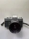 Minolta SRT-102 Camera with a 28mm f2.8 Lens