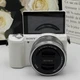 Sony Alpha a5100 24.3MP(white) w/16-50mm OSS silver Lens kit  English Language