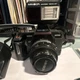 Minolta Maxxum 5000 Black SLR Camera with Flash, Lens, Filter, Manuals