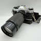 Canon AE 1 Camera With Power Winder and 80-200mm 1:5.4 Lens (w/Issue) - WORKS