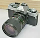 MINOLTA XG-7 CAMERA W/ Tokina AT-X 28-85mm 1:3.5-4.5 Lens UNTESTED 