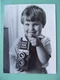 USSR 1980s Boy portrait with Soviet camera LUBITEL-166B. Beautiful Real photo