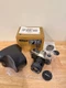 Nikon FM-10 35mm Film Camera with 35-70mm Lens in Original Packaging