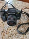 PENTAX SF1 35mm CAMERA WITH STRAP AND LENS Untested Being sold as is