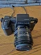 Pentax SF1n Black SLR Camera Sigma Zoom Lens Hoya Filter Manuals LeMans Bag