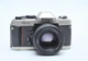 Nikon FM-10 SLR Film Camera W/50mm AF/MF F1.8D Lens 2118441