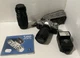 Canon AV-1 35mm SLR Film Camera Lot with 2 Lenses, a Flash and Case.