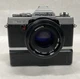 Minolta XG 7  35MM Camera w/minolta 50mm 1:1.7 Lens & Double A Battery Holder