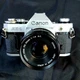 📸 Canon AE-1 35mm Film Camera w FD 50mm f1.8 Lens SLR Vintage