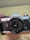 Olympus OM-1 SLR Film Camera Black Silver with OM-System Zuiko Lenses
