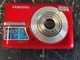 Samsung BL103 10.2MP Digital Camera - Red PARTS/REPAIR BATTERY CORROSION