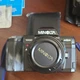 Minolta 7000 Maxxum Black SLR Film Camera with flash attachment and case