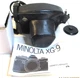MINOLTA XG9~35mm~CAMERA WITH EXTRA LENS, LEATHER CASE WITH STRAP & OWNERS MANUAL