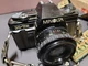 Minolta X-7A 35mm film camera with lenses and accessories ~ w/Film ~ Works!