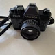 Yashica FX-3 Black 35mm SLR Film Camera w/ Yashica 50mm f/2.0 Lens