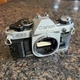 Canon AE-1 Program 35mm Film SLR Camera Body, Chrome (For Parts & Repair)
