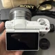 Sony Alpha a5100 24MP Mirrorless White Digital Camera w/ 16-50mm Lens English