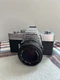 Minolta SRT 102 35mm SLR Film Camera with 50mm Lens