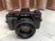 Macchina fotografica Minolta X-300s con obiettivo MD f/1.7 50mm