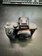 Sony a7 III with Viltrox 28mm F4.8, extra battery, and charger.