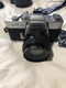 Vintage Minolta SRT102 Camera With Lenses