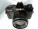 Minolta X-7A 35mm SLR Film Camera,ALBINAR ADC 28/2.8 Lens,AUTO 220X Min.FL.READ