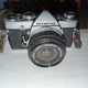 Olympus Black OM-1n film camera w 24mm  Zuiko lens