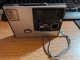 Silver Kodak Disc 4000 Camera  by EASTMAN KODAK COMPANY with strap UNTESTED