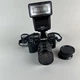 Minolta Maxxum 7000 AF With Lens and Flash Turns on but I can't get it to work