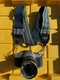 Canon AV-1 SLR Film Camera - Silver with Canon fd 135mm 1:3.5 lens With Strap