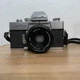 Minolta SRT 102 SLR Camera MD Rokkor-X 45mm 1:2 Lens w/ Strap Not Tested
