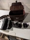 Olympus OM-10 35mm Camera w/ Zuiko 50mm f/1.8 lens Rokinon & Case Vintage 