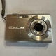 Casio Exilim EX-Z60 6.0MP Silver Digital Camera  -No Charger Untested Parts Only