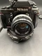 Nikon FM 35mm SLR Film Camera with 50 mm lens Kit