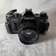 Vintage Canon AE-1 35mm SLR Camera Black Body w/ FD 50mm 1:1.8 Lens Hoya Filter