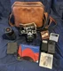 Nikon FE 35mm SLR Film Camera W/Case, Zoom Lens, Flash, Lens Covers, Papers