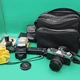 Minolta XG7 Vintage Film Camera W/ 55mm Lens Filters Flash Winder Bag Untested 