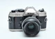 Nikon FM-10 SLR Film Camera W/50mm F2Ai Lens 2318263