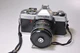 Minolta XG-7 35mm Film Camera  macro lens  sold as is - powers on - not tested A